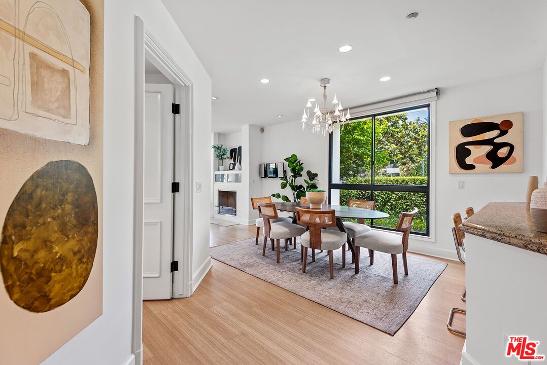 Chandelier, Dining room, Fireplace, Interior, Pendant Lights, Recessed Lighting, Wood Texture Flooring