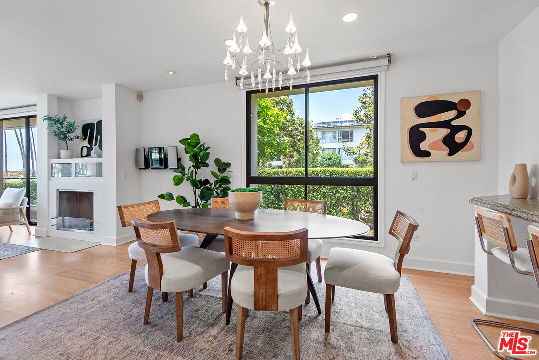 Chandelier, Dining room, Fireplace, Interior, Recessed Lighting, Wood Texture Flooring