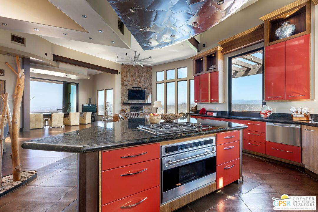 Fireplace, Interior, Kitchen, Recessed Lighting, Stainless Steel Appliances, Stone Walls