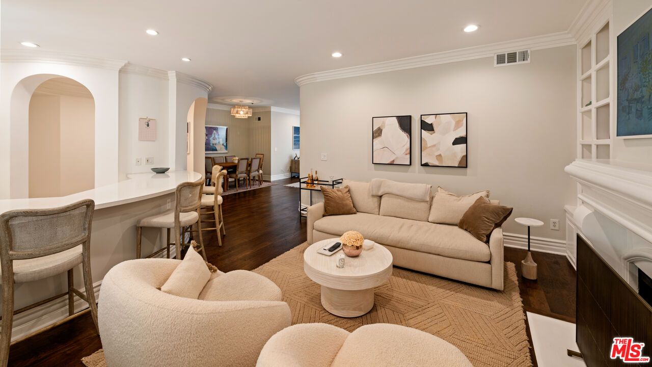 Dining room, Fireplace, Interior, Living room, Recessed Lighting, Wood Texture Flooring