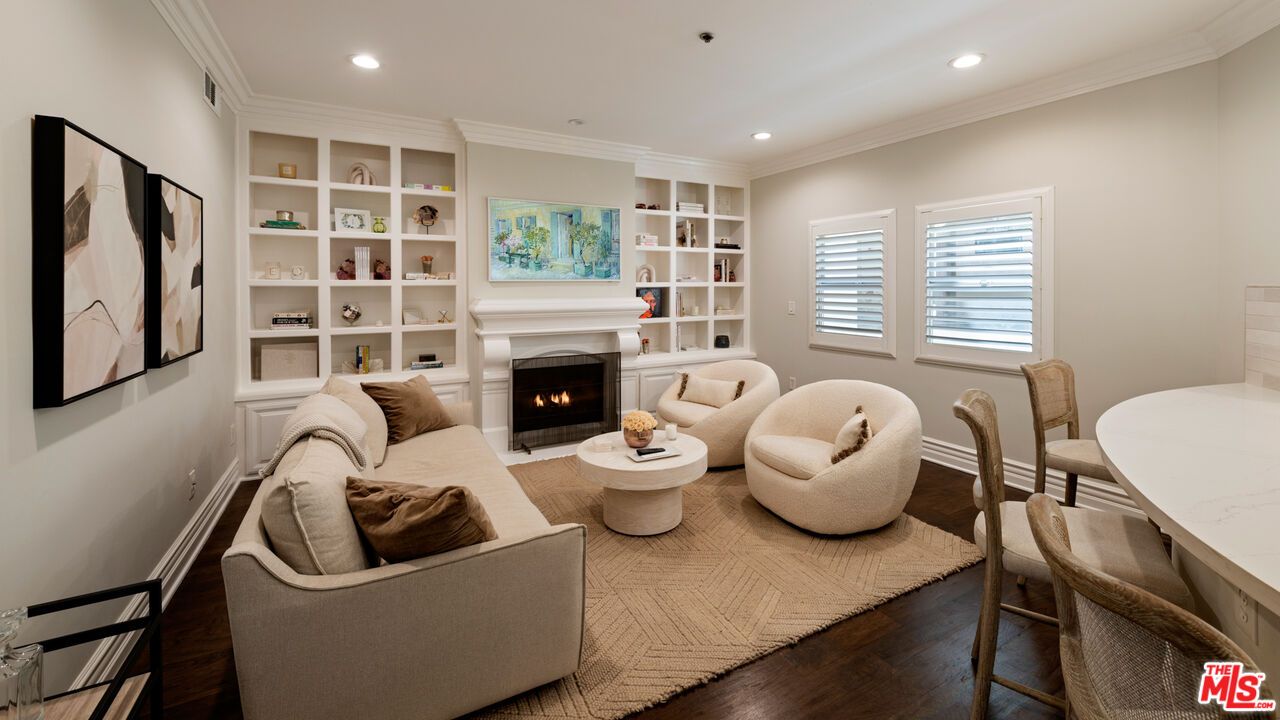 Dining room, Fireplace, Interior, Living room, Recessed Lighting, Wood Texture Flooring