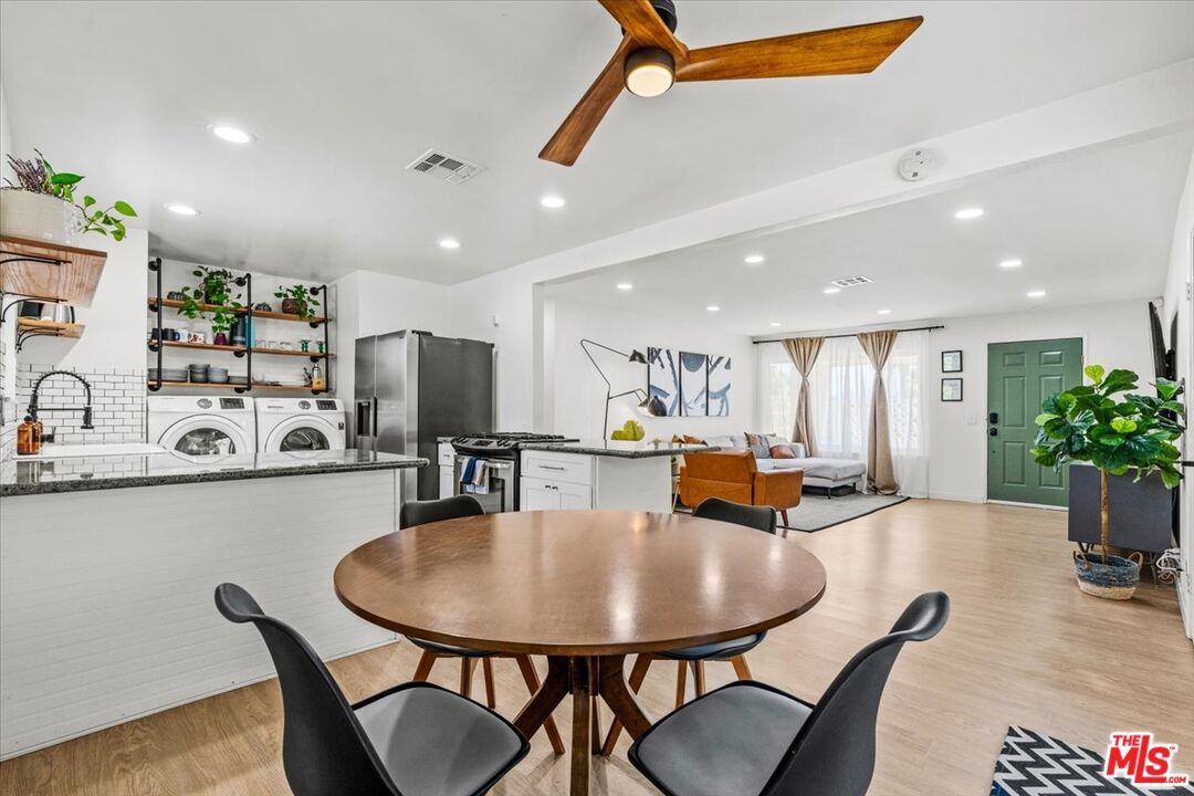Dining room, Interior, Kitchen, Recessed Lighting, Stainless Steel Appliances, Wood Texture Flooring