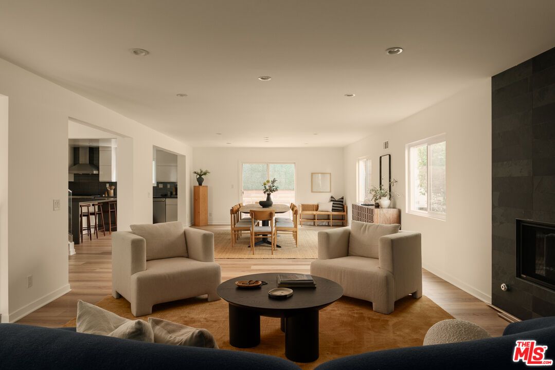 Dining room, Fireplace, Interior, Kitchen, Living room, Recessed Lighting, Wood Texture Flooring