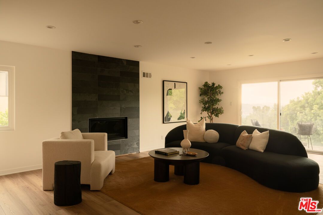 Fireplace, Interior, Living room, Recessed Lighting, Wood Texture Flooring