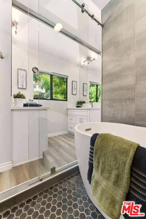 Bathroom, Free Standing Baths, Glass Shower, Interior, Pendant Lights, Wood Texture Flooring