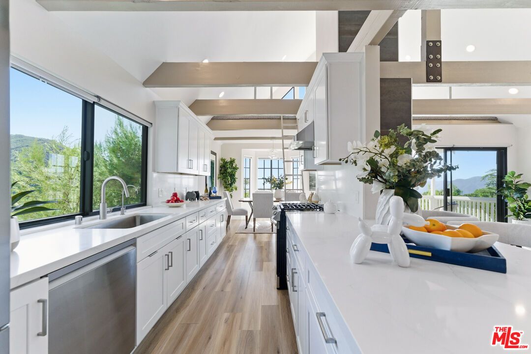 Dining room, Interior, Kitchen, Recessed Lighting, Stainless Steel Appliances, Wood Texture Flooring