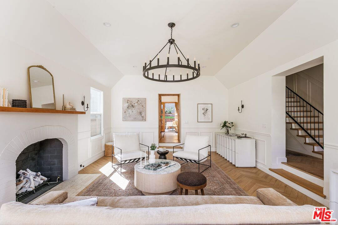 Chandelier, Fireplace, Interior, Living room, Recessed Lighting, Wood Texture Flooring