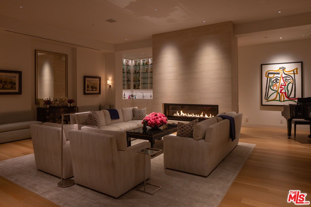 Fireplace, Interior, Living room, Piano, Recessed Lighting, Wood Texture Flooring