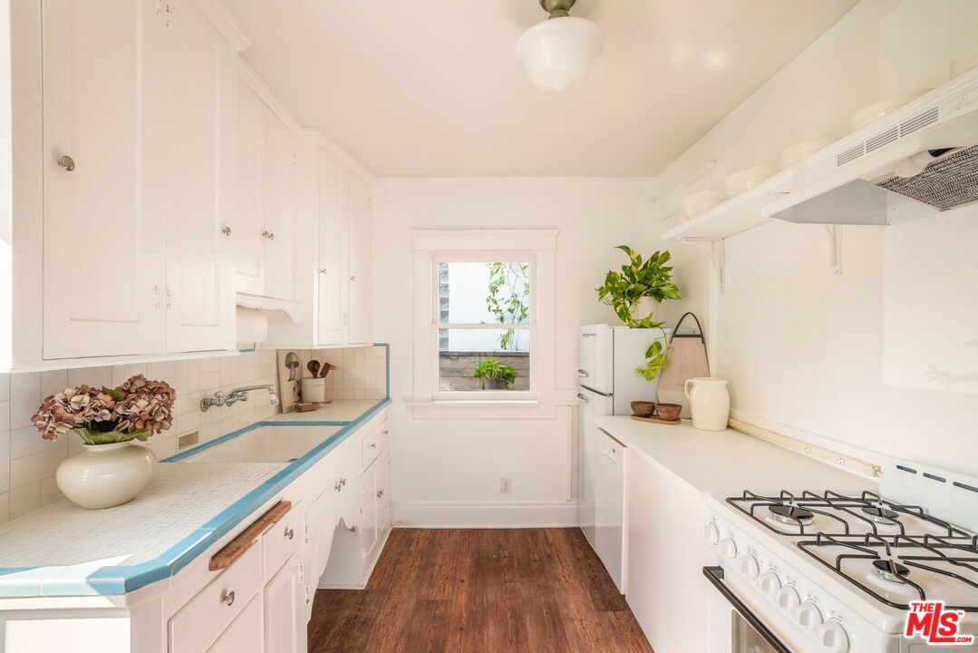 Interior, Kitchen, Tile Countertops, Wood Texture Flooring