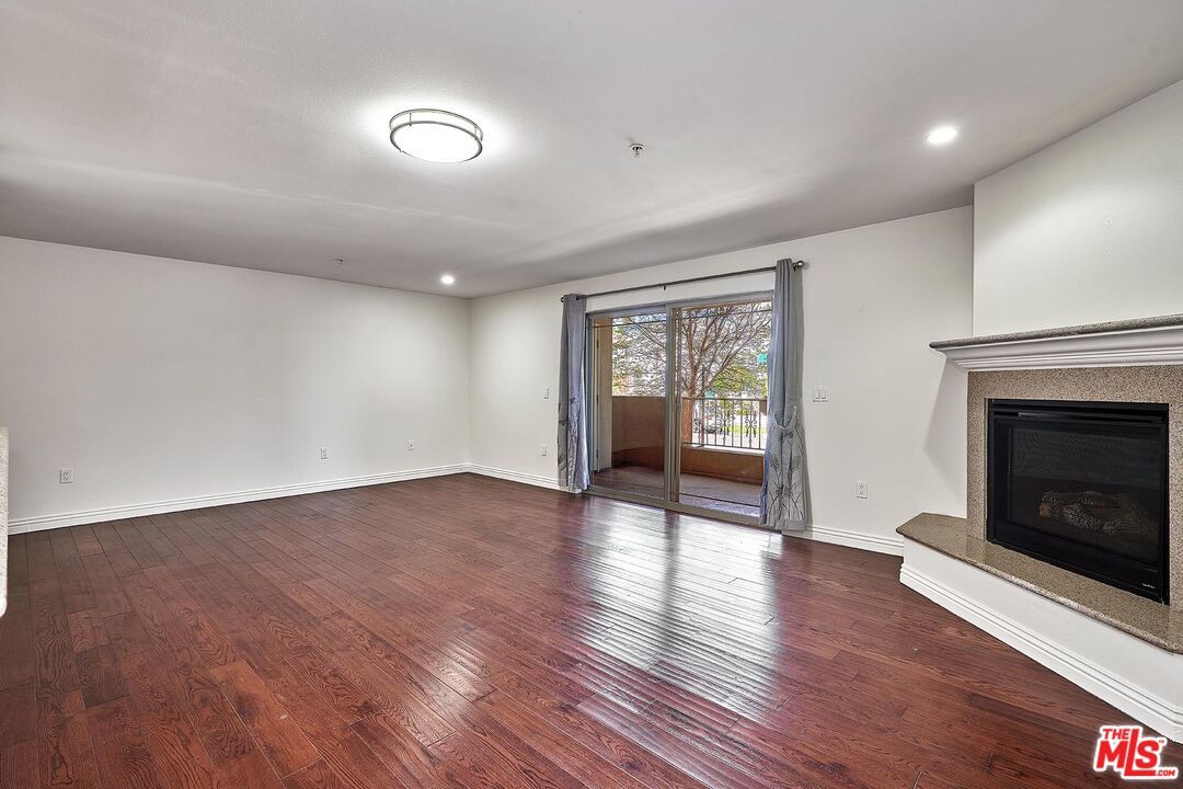 Empty room, Fireplace, Interior, Recessed Lighting, Wood Texture Flooring