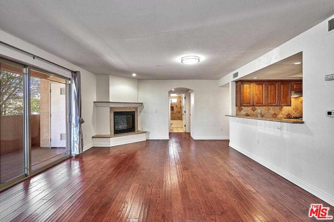 Empty room, Fireplace, Interior, Recessed Lighting, Wood Texture Flooring