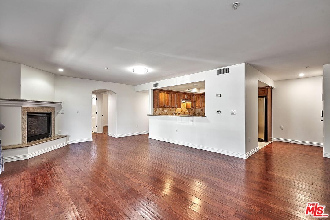 Empty room, Fireplace, Interior, Recessed Lighting, Wood Texture Flooring