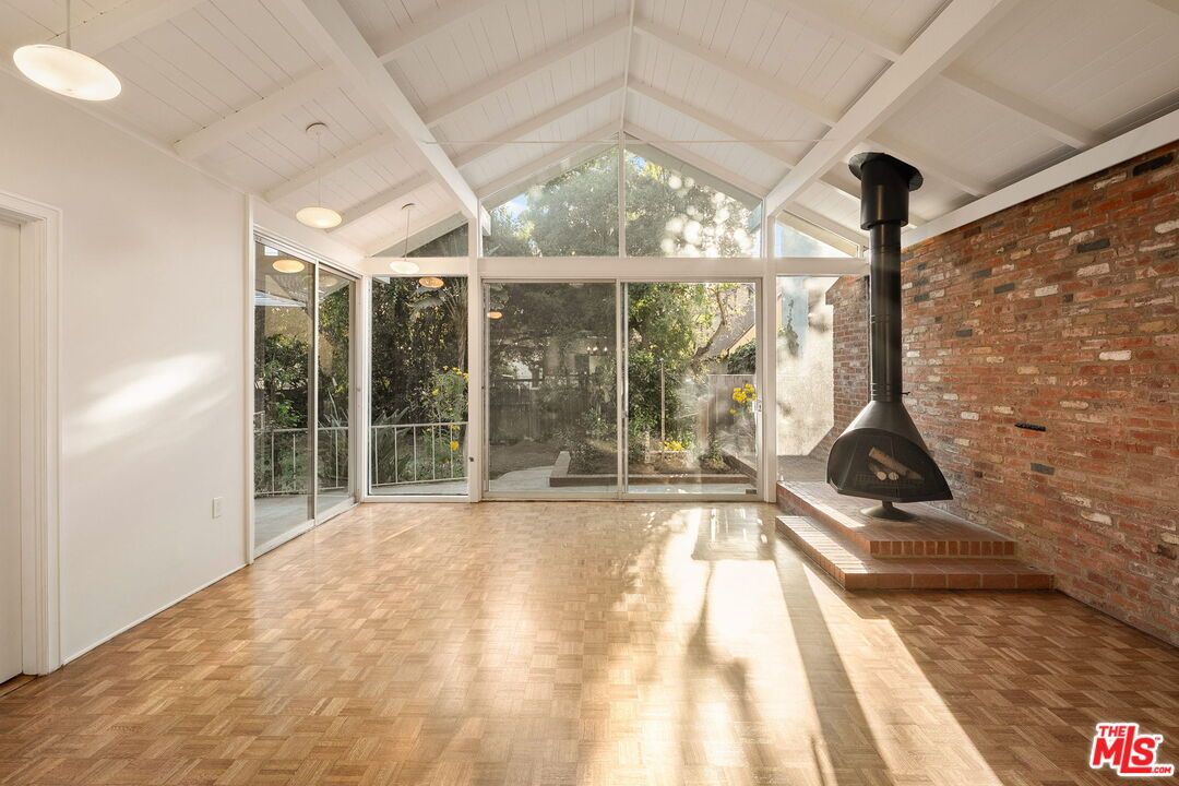 Empty room, Fireplace, Interior, Pendant Lights, Stone Walls, Wood Texture Flooring