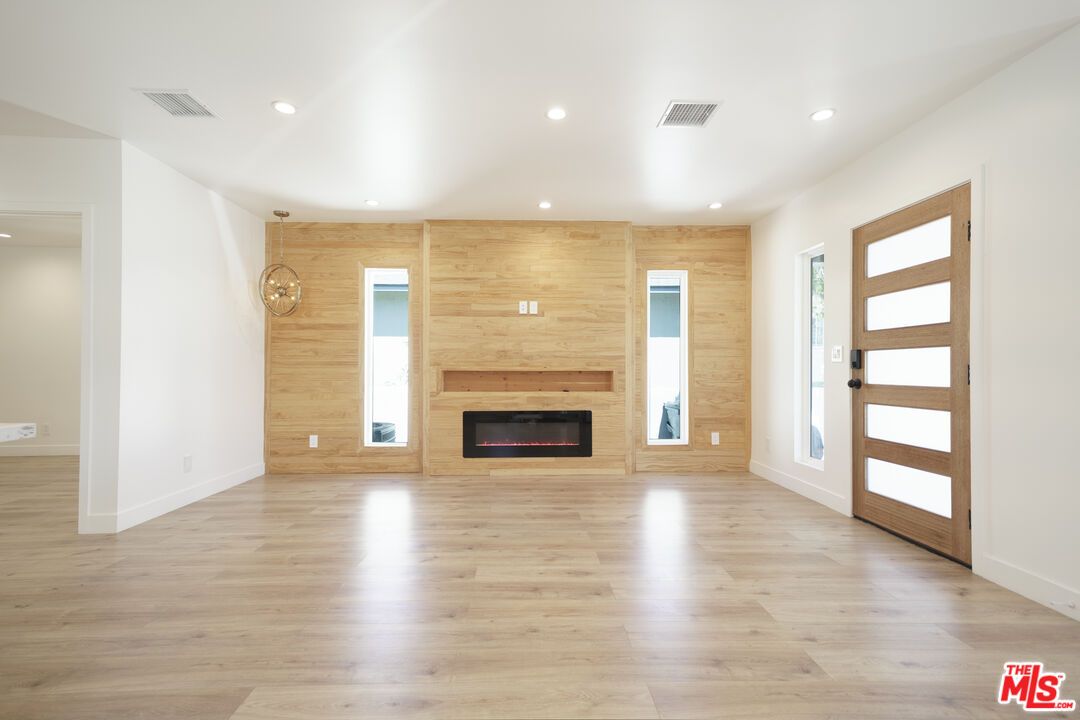 Empty room, Fireplace, Interior, Recessed Lighting, Wood Texture Flooring, Wooden Walls