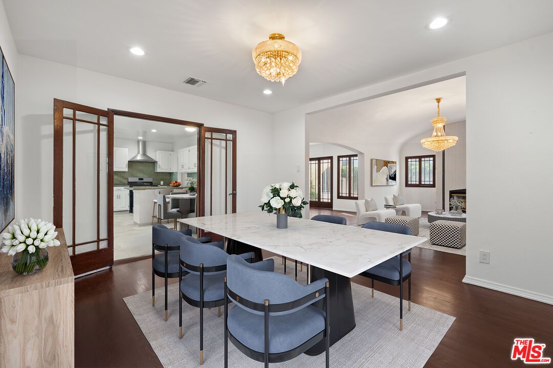 Chandelier, Dining room, Interior, Kitchen, Living room, Recessed Lighting, Stainless Steel Appliances, Wood Texture Flooring