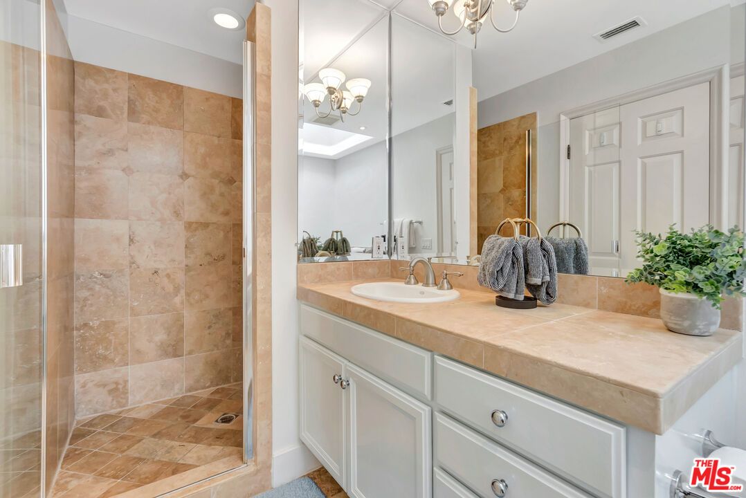 Bathroom, Dual Sink Vanities, Interior, Recessed Lighting, Tile Countertops