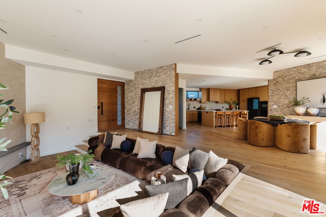 Dining room, Interior, Kitchen, Living room, Recessed Lighting, Stone Walls, Wood Texture Flooring