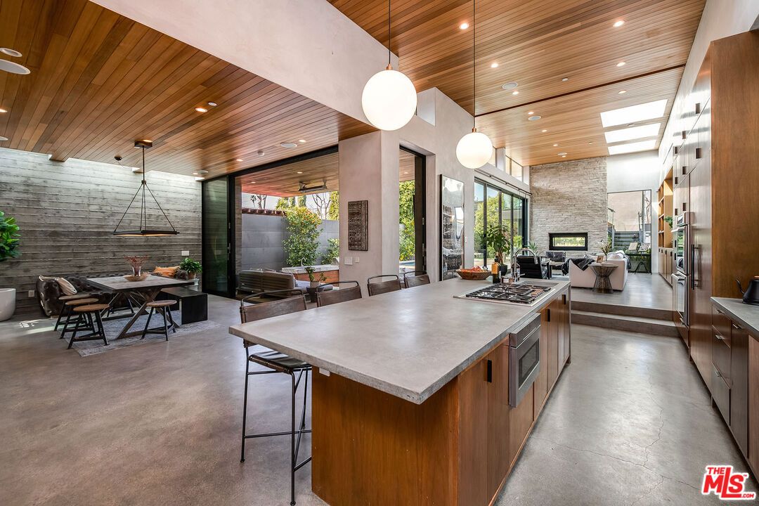 Dining room, Fireplace, Interior, Kitchen, Living room, Pendant Lights, Recessed Lighting, Stone Walls, Wooden Ceilings