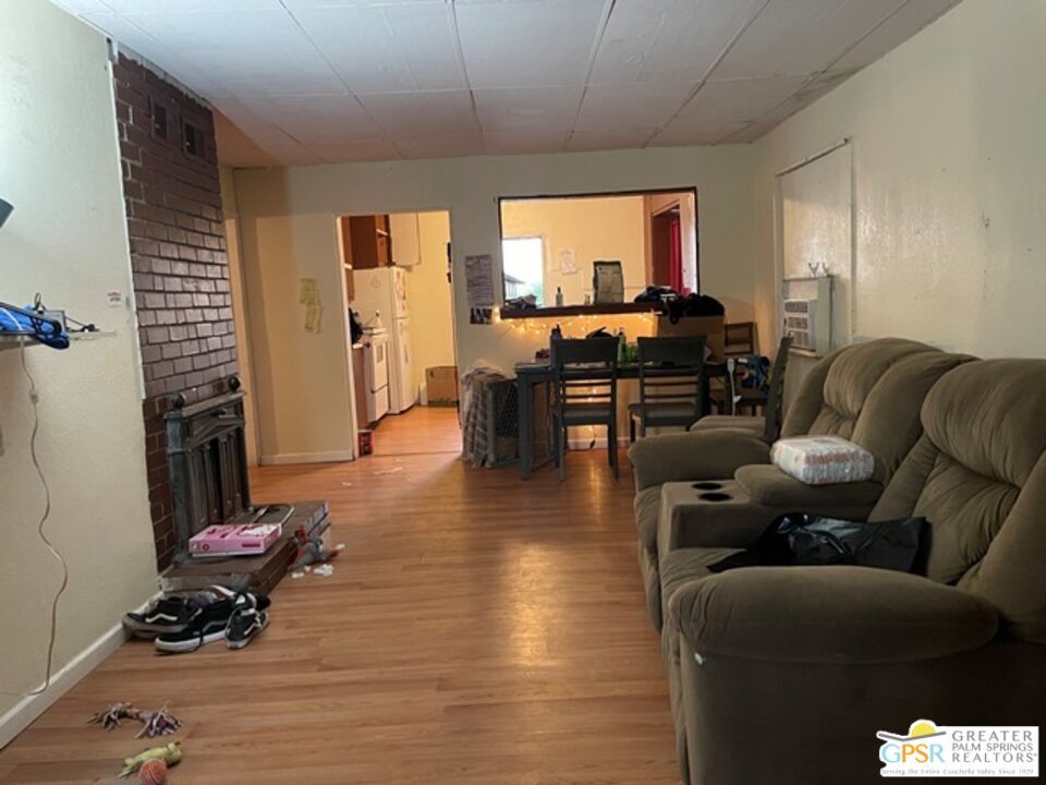 Dining room, Fireplace, Interior, Living room, Stone Walls, Wood Texture Flooring