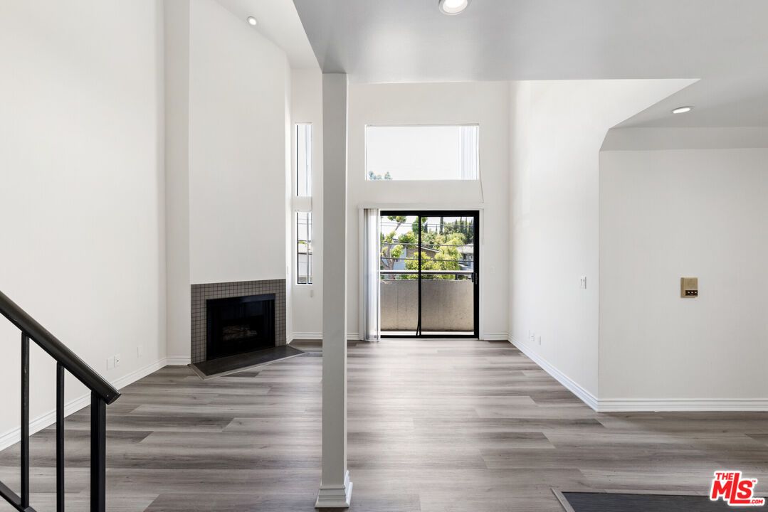 Empty room, Fireplace, Interior, Recessed Lighting, Wood Texture Flooring