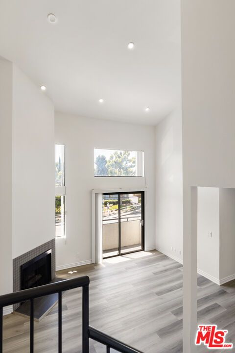 Empty room, Fireplace, Interior, Recessed Lighting, Wood Texture Flooring