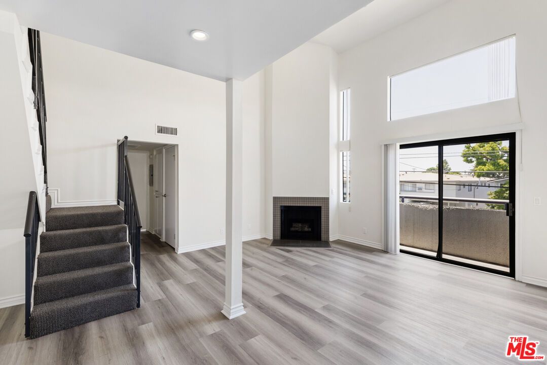 Empty room, Fireplace, Interior, Recessed Lighting, Wood Texture Flooring