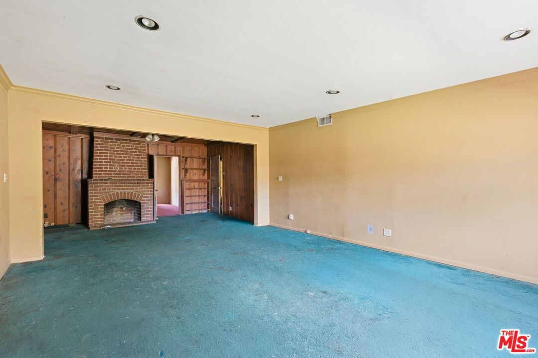 Empty room, Fireplace, Interior, Recessed Lighting, Stone Walls