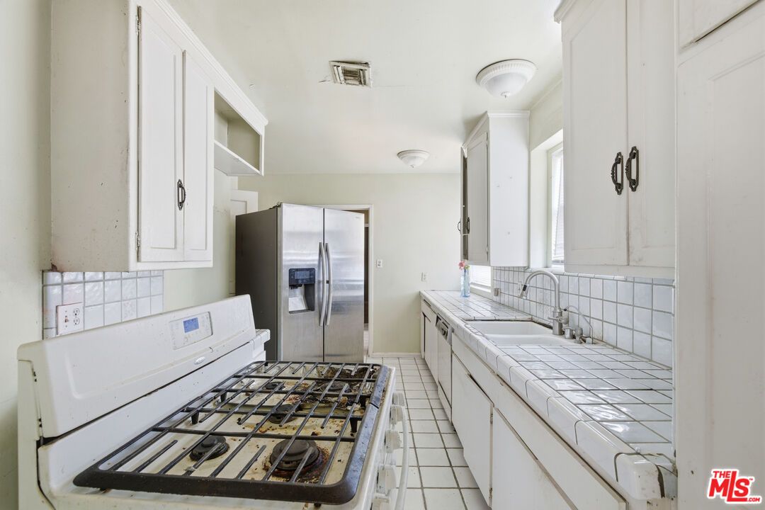 Interior, Kitchen, Stainless Steel Appliances, Tile Countertops