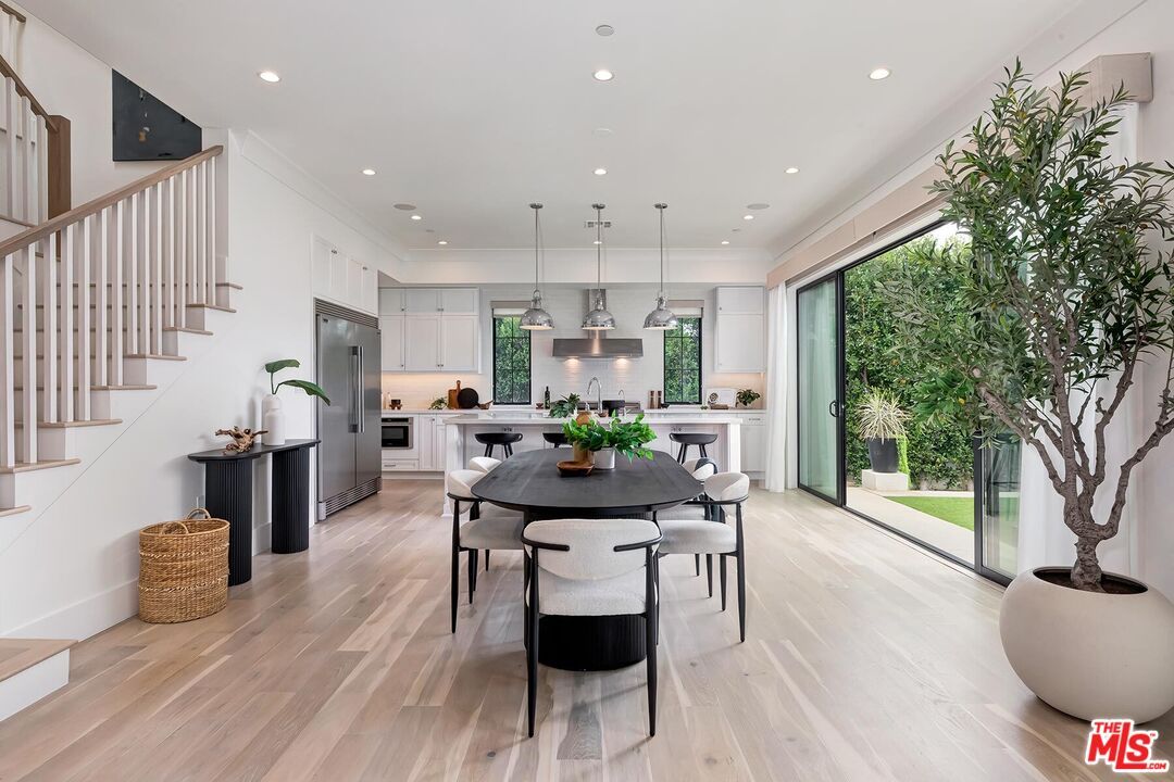 Dining room, Interior, Kitchen, Pendant Lights, Recessed Lighting, Stainless Steel Appliances, Wood Texture Flooring