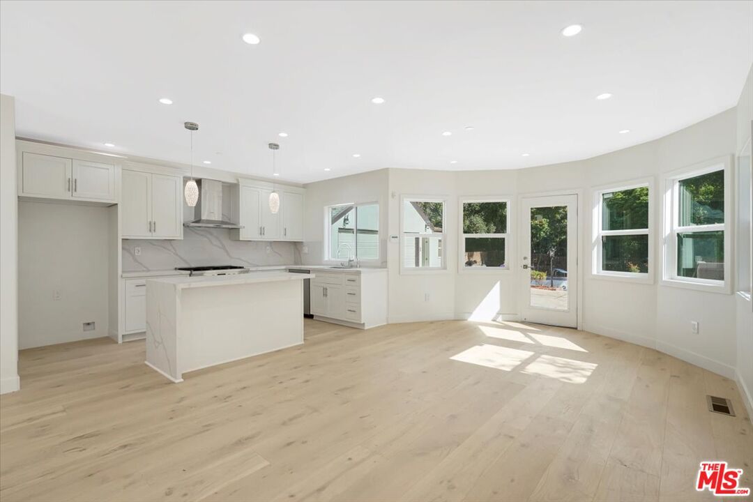 Interior, Kitchen, Marble Walls, Pendant Lights, Recessed Lighting, Wood Texture Flooring
