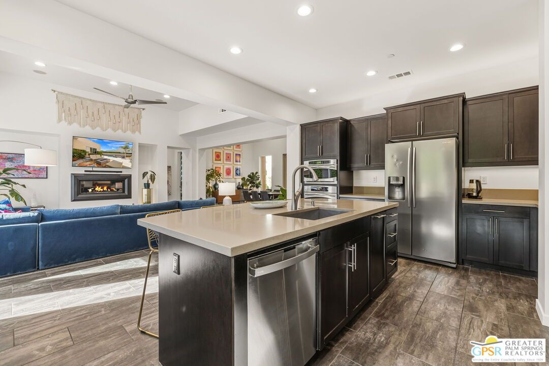 Fireplace, Interior, Kitchen, Living room, Recessed Lighting, Stainless Steel Appliances, Wood Texture Flooring