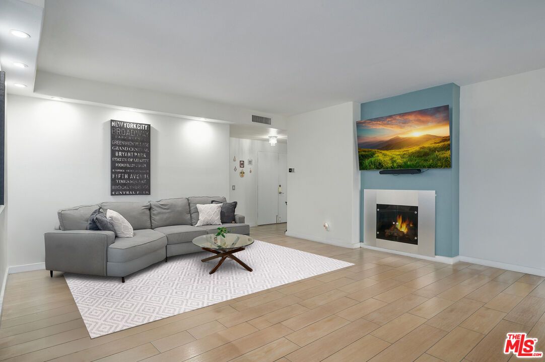 Fireplace, Interior, Living room, Recessed Lighting, Wood Texture Flooring