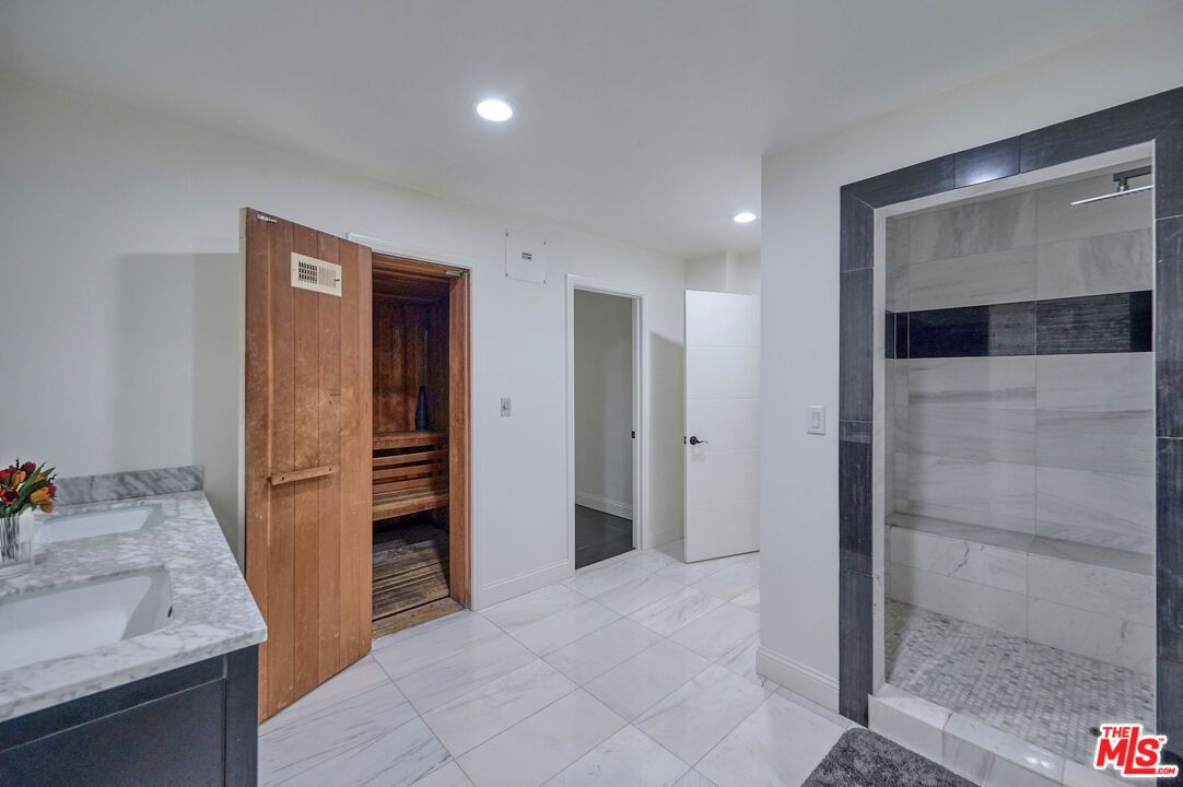 Bathroom, Dual Sink Vanities, Glass Shower, Interior, Marble, Recessed Lighting, Sauna Room