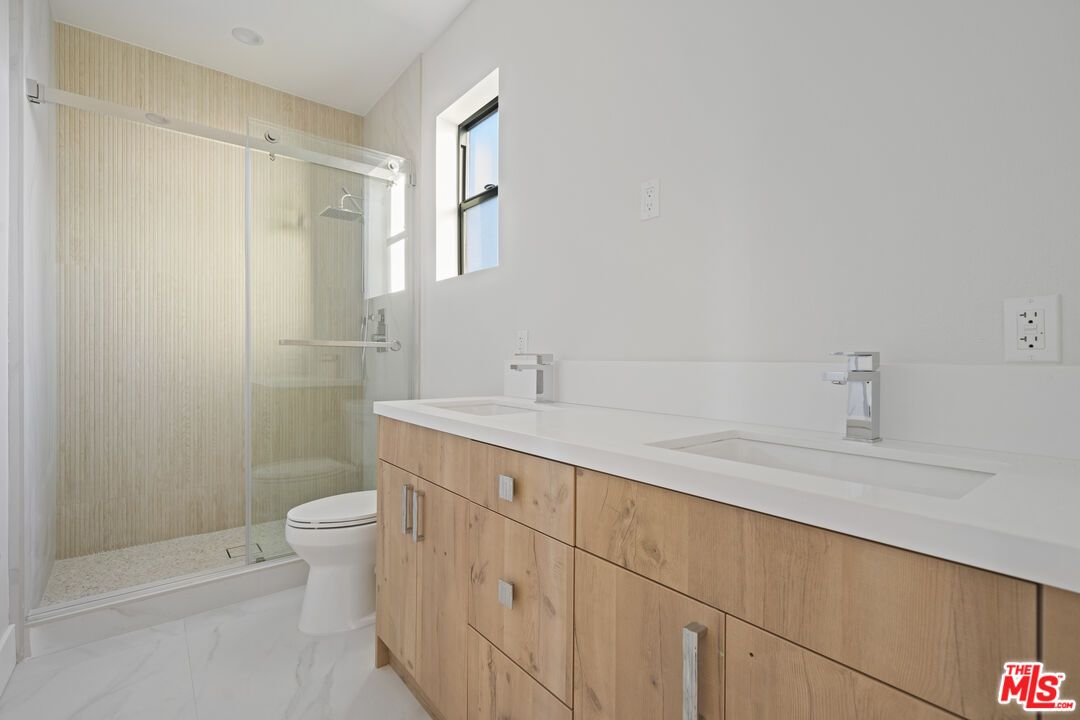 Bathroom, Dual Sink Vanities, Glass Shower, Interior, Marble, Recessed Lighting