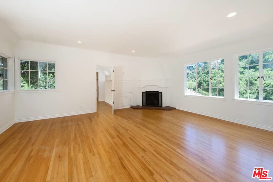 Empty room, Fireplace, Interior, Recessed Lighting, Wood Texture Flooring