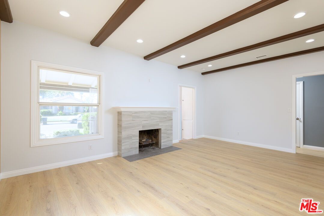 Empty room, Fireplace, Interior, Recessed Lighting, Wooden Beams, Wood Texture Flooring