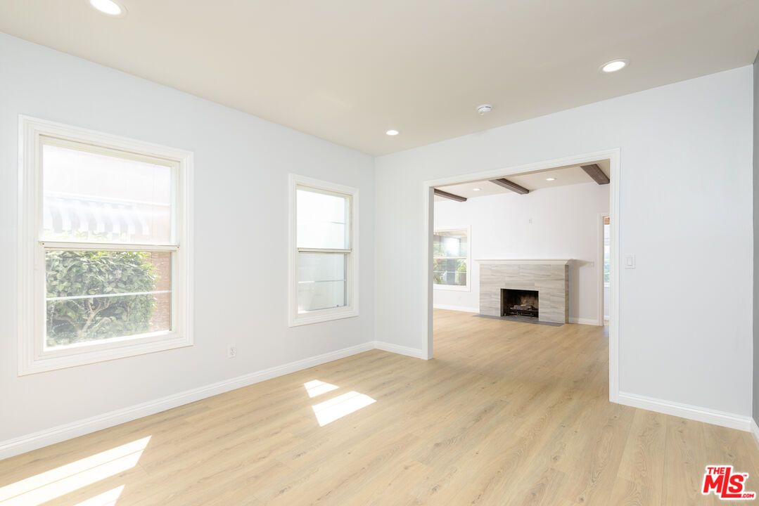Empty room, Fireplace, Interior, Recessed Lighting, Wooden Beams, Wood Texture Flooring