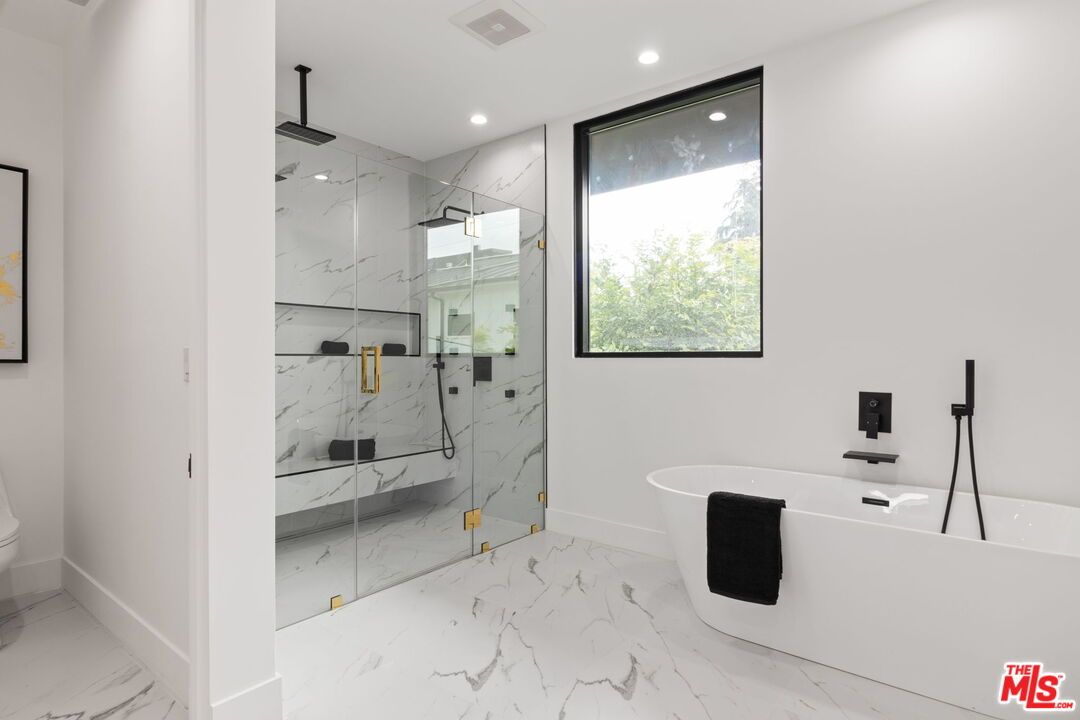 Bathroom, Free Standing Baths, Glass Shower, Interior, Marble, Marble Walls, Recessed Lighting