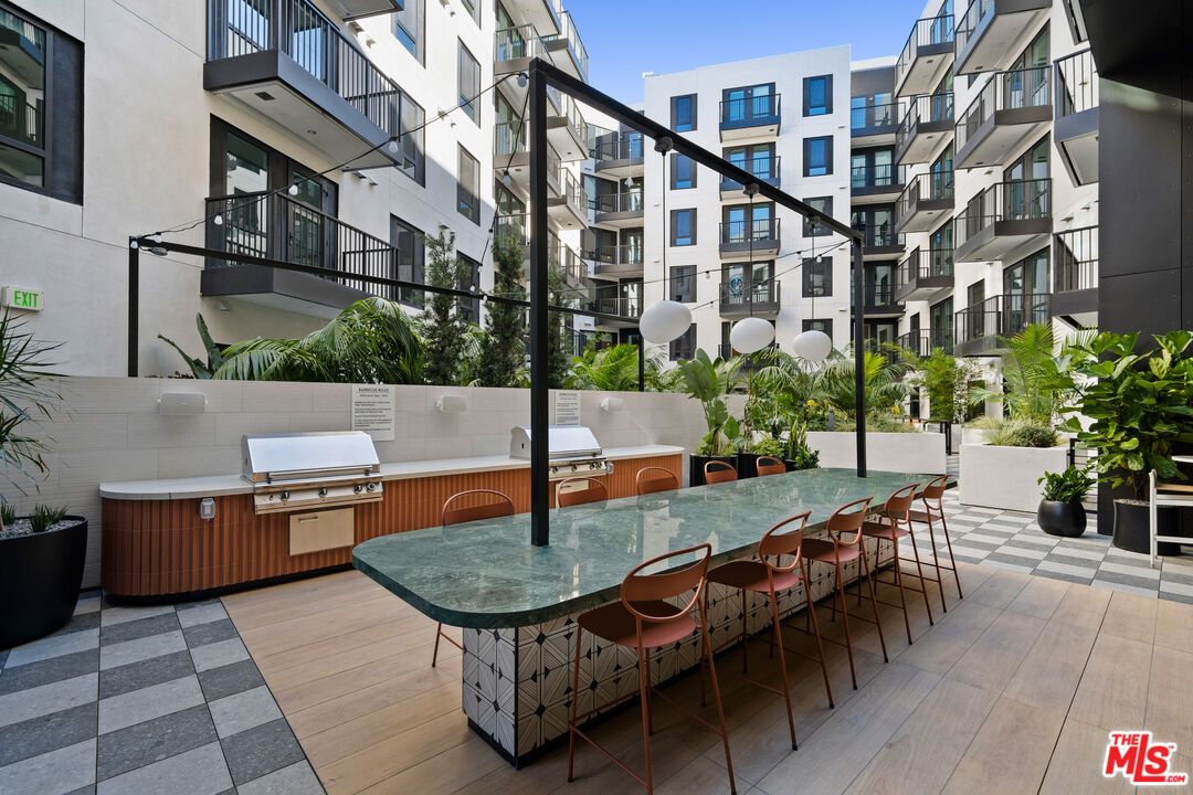 Exterior, Hot Tub, Outdoor Kitchen