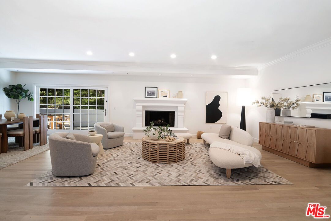 Dining room, Fireplace, Interior, Living room, Recessed Lighting, Wood Texture Flooring
