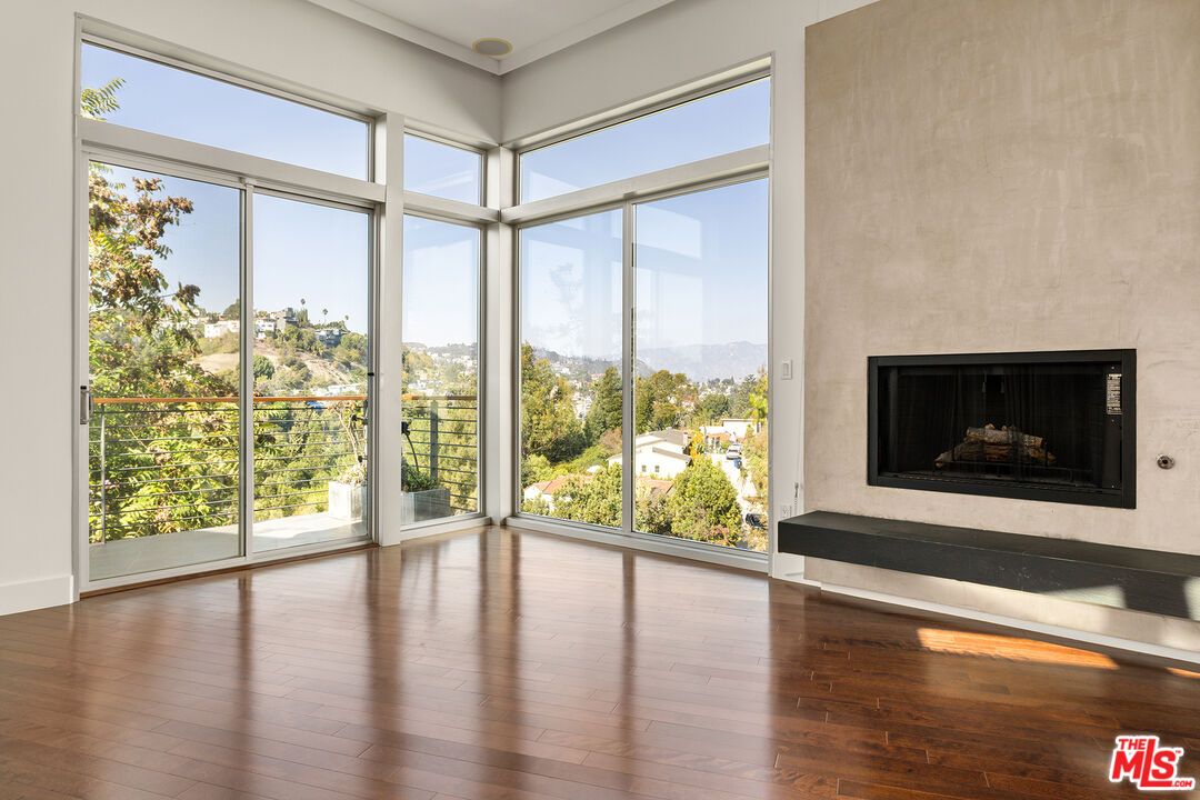 Empty room, Fireplace, Interior, Sun Room, Wood Texture Flooring