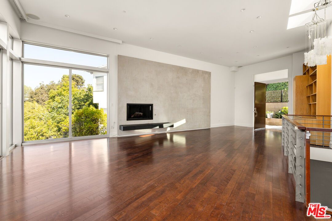 Chandelier, Empty room, Fireplace, Interior, Recessed Lighting, Wood Texture Flooring