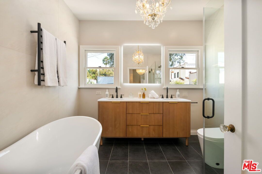 Bathroom, Chandelier, Dual Sink Vanities, Free Standing Baths, Glass Shower, Interior
