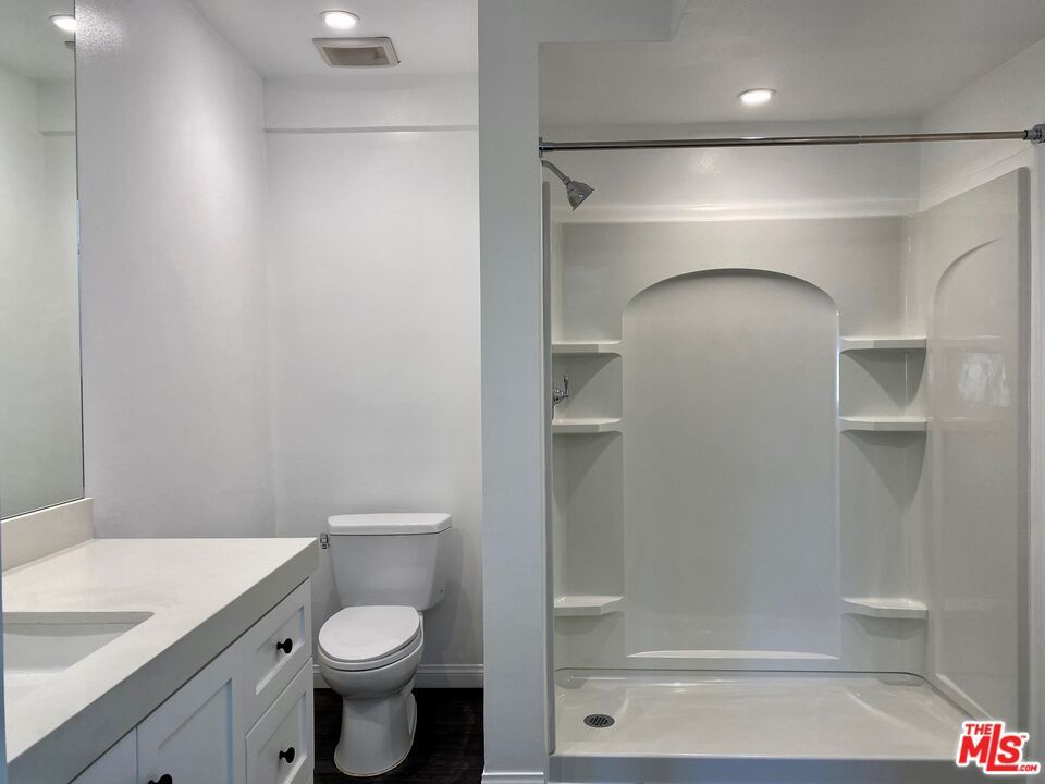 Bathroom, Glass Shower, Interior, Recessed Lighting, Wood Texture Flooring