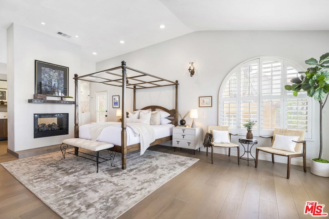 Bedroom, Fireplace, Interior, Recessed Lighting, Wood Texture Flooring