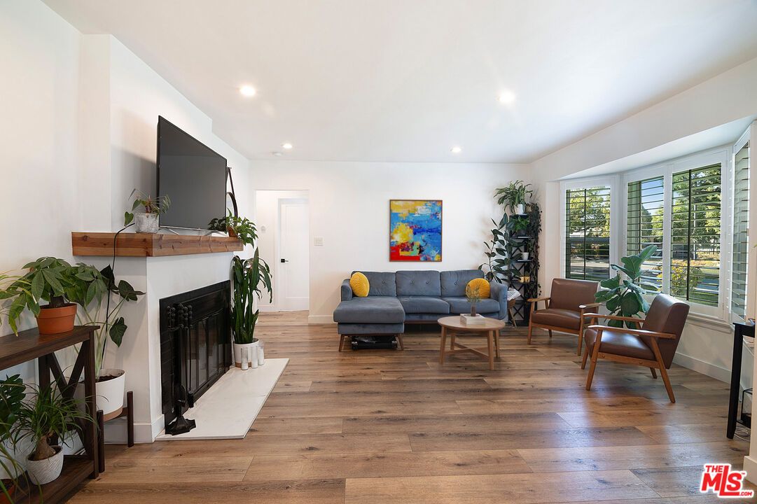 Fireplace, Interior, Living room, Recessed Lighting, Wood Texture Flooring