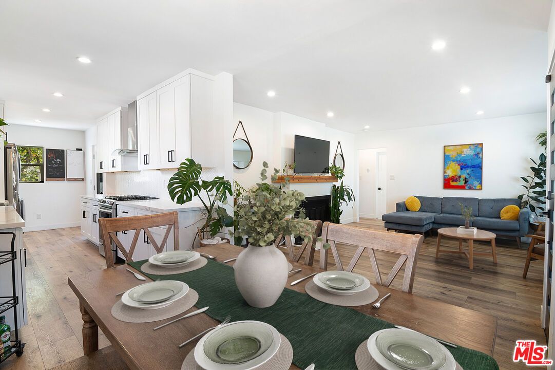 Dining room, Fireplace, Interior, Kitchen, Living room, Recessed Lighting, Wood Texture Flooring