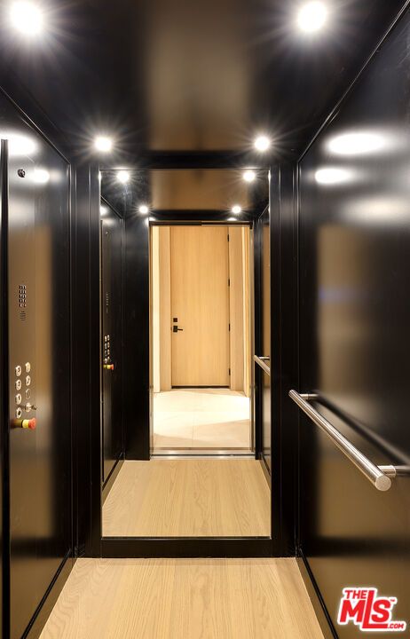Elevator, Interior, Recessed Lighting, Wood Texture Flooring