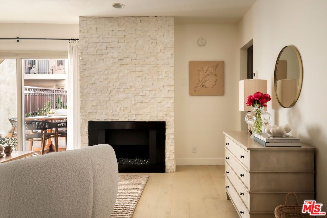 Fireplace, Interior, Recessed Lighting, Stone Walls, Wood Texture Flooring