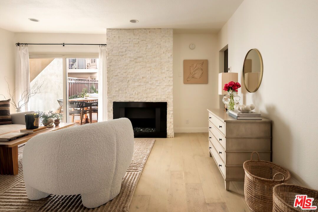 Fireplace, Interior, Recessed Lighting, Stone Walls, Wood Texture Flooring